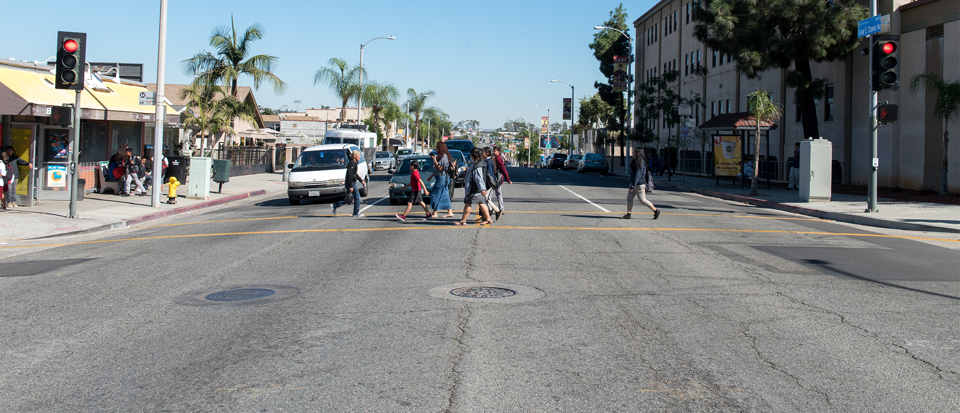 people crossing street on cross walk