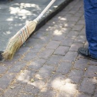 Using a broom to clean outdoor areas, saves 8-18 gallons of water per minute